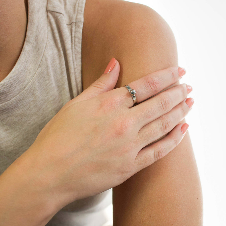Self Defense Ring with Shiny Sphere Top on Woman&